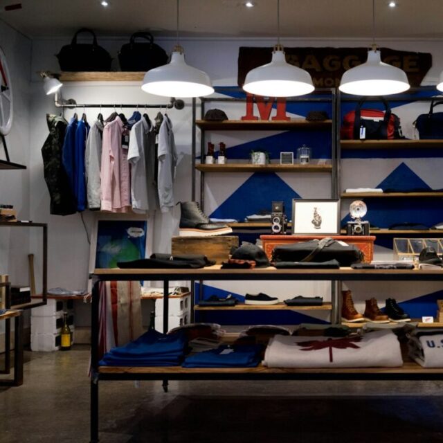 Shelves and rails inside a menswear shop