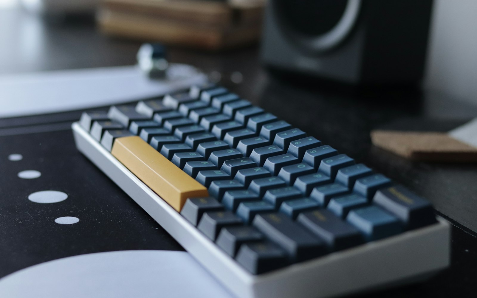 A keyboard and desk from above