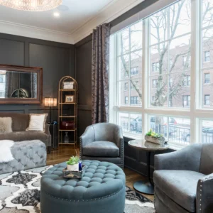 Elegant and spacious living room with modern design and cozy furnishings.